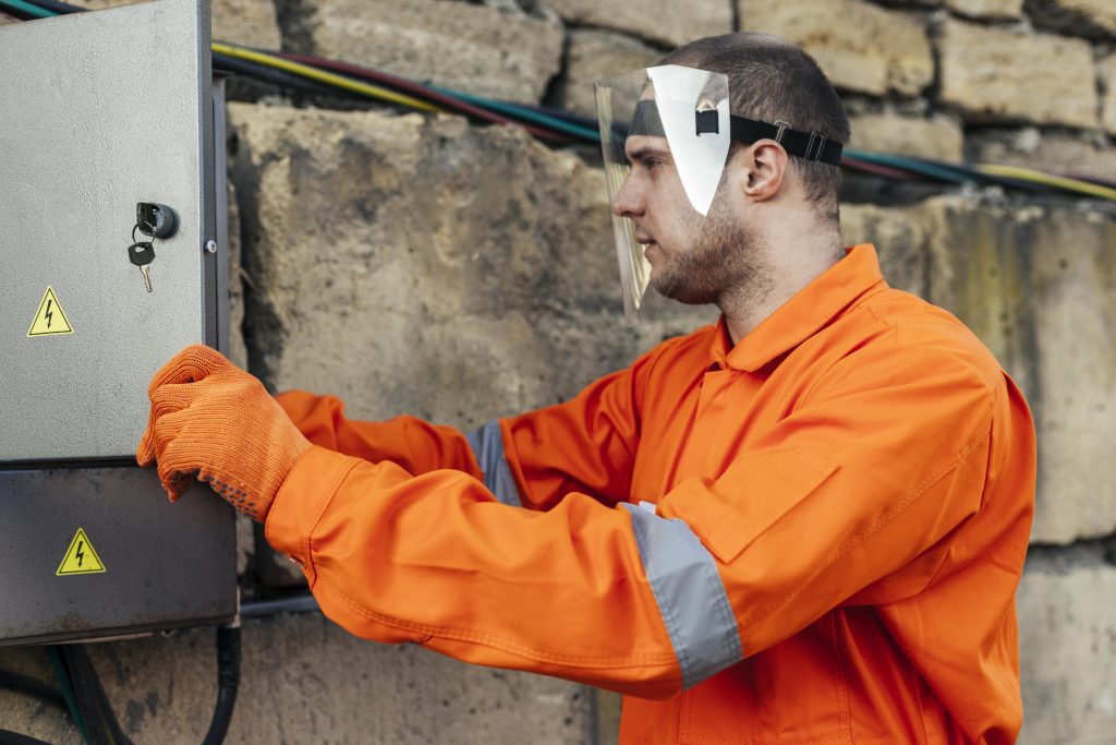 side-view-electrician-uniform-with-protective-gloves-face-shield